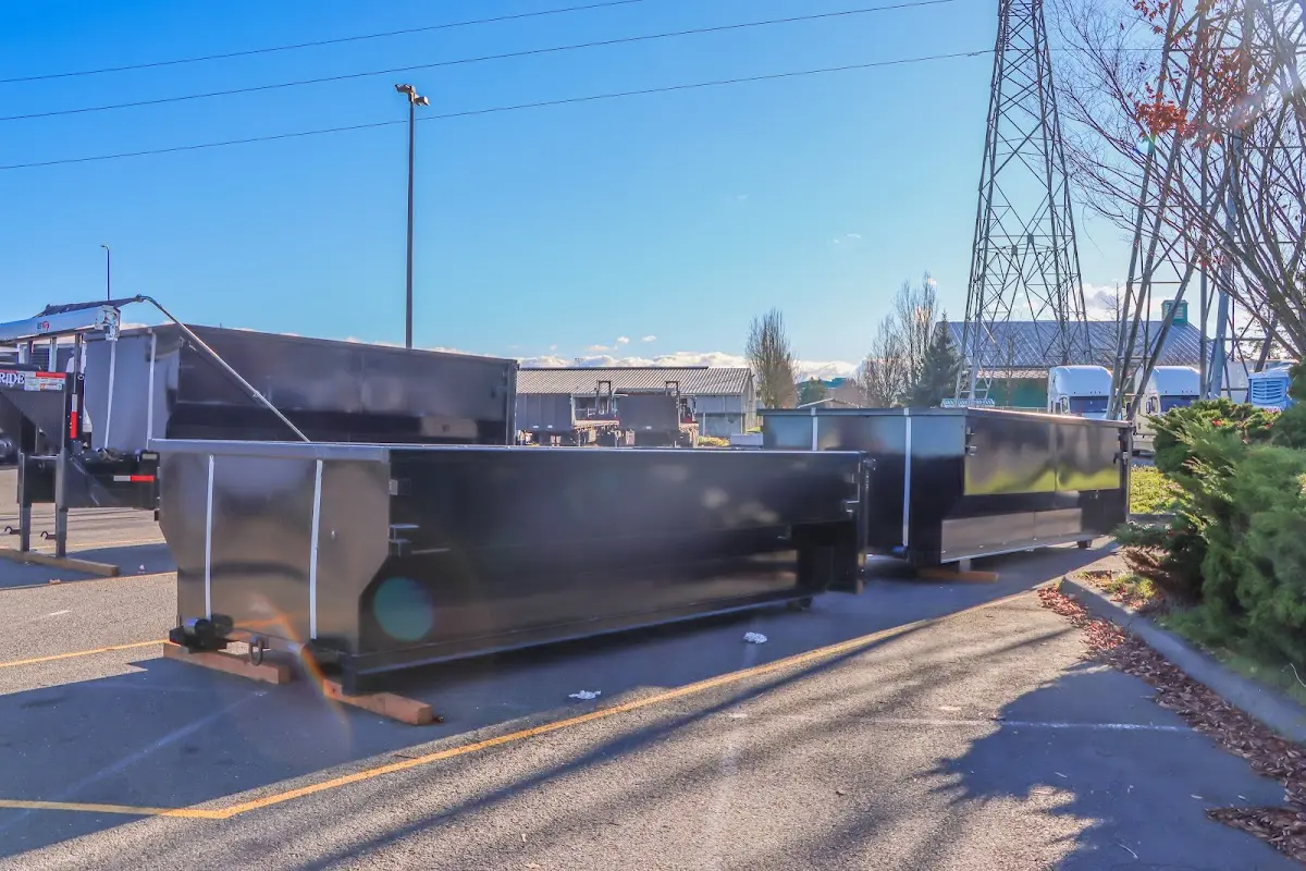 Roll-off dumpster ready for waste disposal at job site for Concrete Dumpster Rental in Loxley